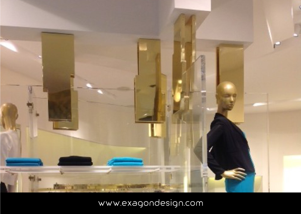 Versace-Tblisi-shop-flying-wardrobe-plexiglas-and-brass-exagon-design_03