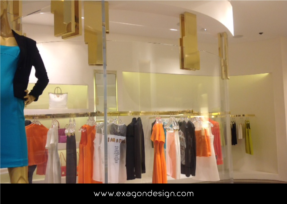 Versace-Tblisi-shop-flying-wardrobe-plexiglas-and-brass-exagon-design_09